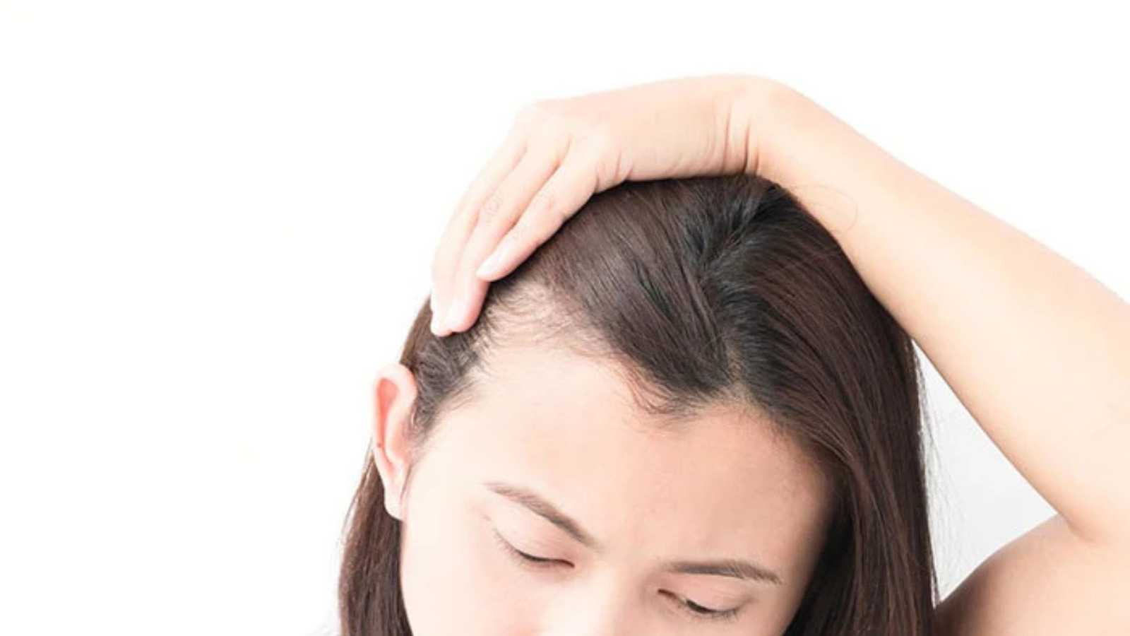 Hair Thinning After Childbirth: Causes and Dermatologist-Backed Solutions